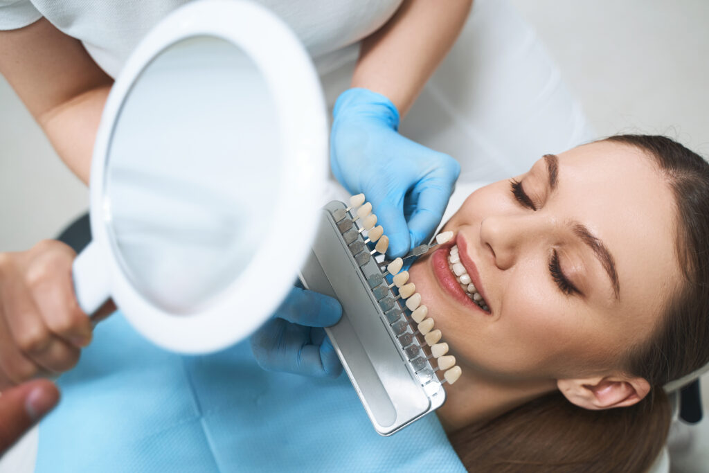 woman at a dentist choosing veneers