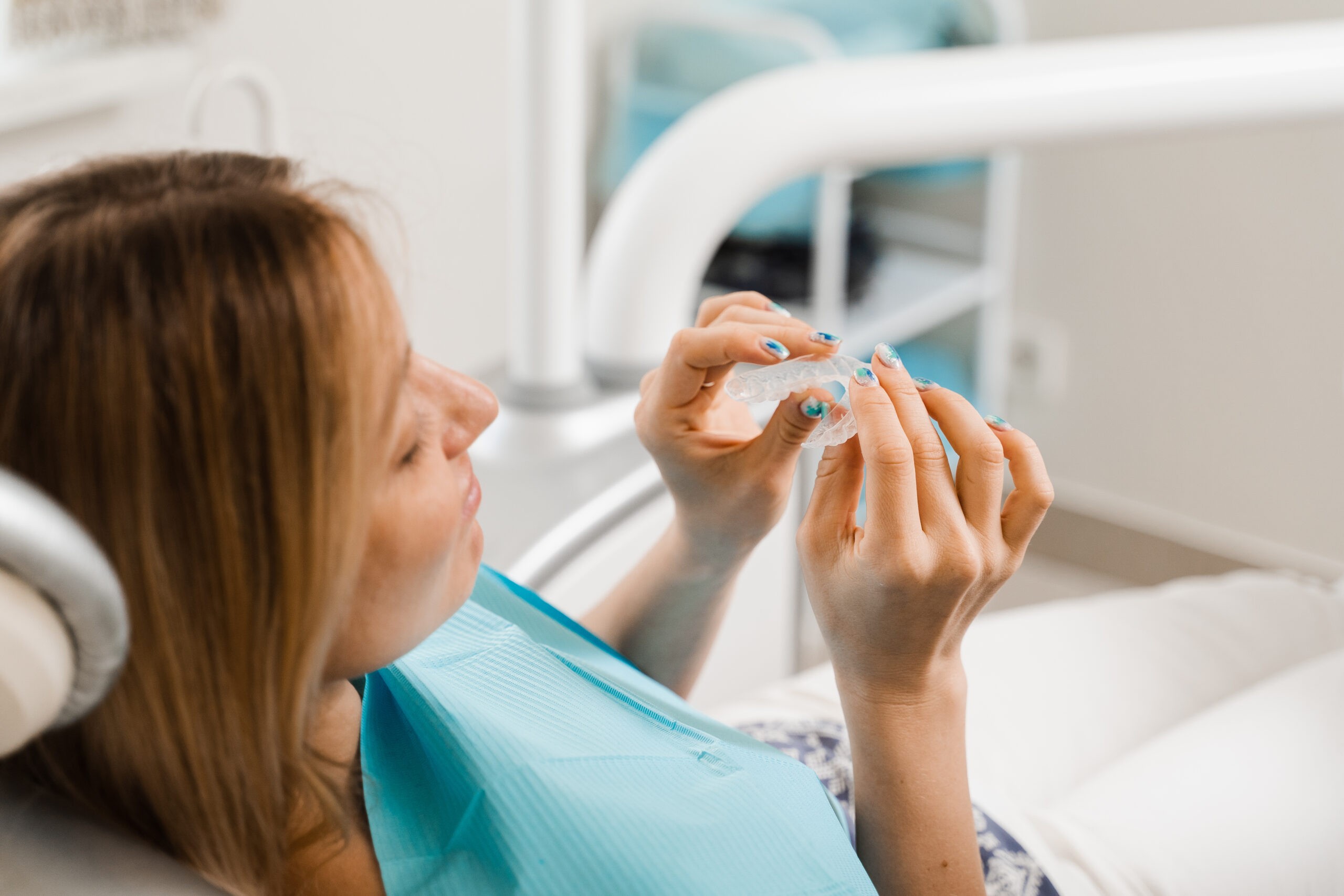 woman receiving single arch clear aligner treatment